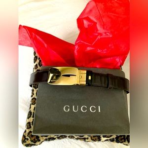 Vintage Gucci signature belt . reversible black/brown with gold buckle